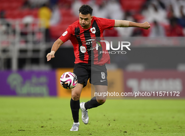 Mahmoud Ahmed Hassan of Al Rayyan SC plays in the Ooredoo Qatar Stars League 24/25 match between Al Rayyan SC and Al Shahania SC at Ahmad Bi...