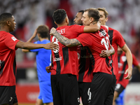 Mahmoud Ahmed Hassan (2nd L) of Al Rayyan SC celebrates with his teammates after scoring a goal during the Ooredoo Qatar Stars League 24/25...