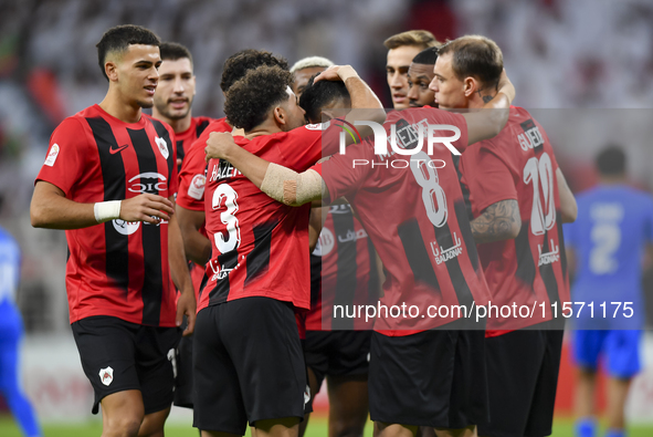 Mahmoud Ahmed Hassan (2nd R) of Al Rayyan SC celebrates with his teammates after scoring a goal during the Ooredoo Qatar Stars League 24/25...