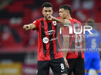 Mahmoud Ahmed Hassan of Al Rayyan SC celebrates after scoring a goal during the Ooredoo Qatar Stars League 24/25 match between Al Rayyan SC...