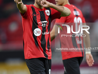 Mahmoud Ahmed Hassan of Al Rayyan SC celebrates after scoring a goal during the Ooredoo Qatar Stars League 24/25 match between Al Rayyan SC...