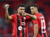 Mahmoud Ahmed Hassan of Al Rayyan SC celebrates after scoring a goal during the Ooredoo Qatar Stars League 24/25 match between Al Rayyan SC...