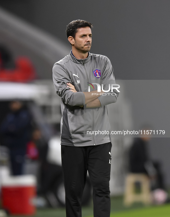 Al Shahania SC head coach Alvaro Perez reacts during the Ooredoo Qatar Stars League 24/25 match between Al Rayyan SC and Al Shahania SC at A...