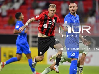 Roger Krug Guedes (C) of Al Rayyan SC celebrates after scoring a goal during the Ooredoo Qatar Stars League 24/25 match between Al Rayyan SC...