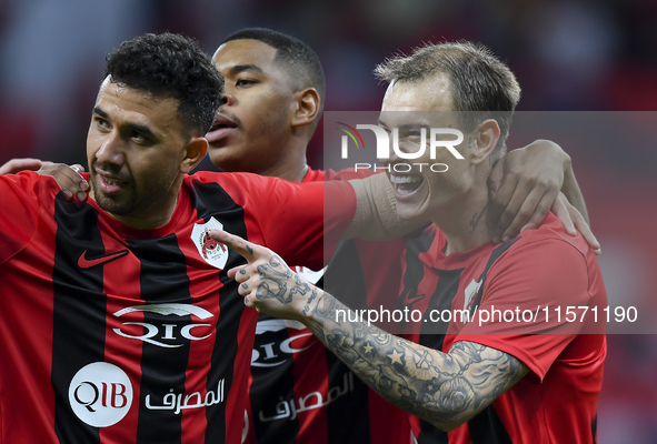 Roger Krug Guedes (R) of Al Rayyan SC celebrates after scoring a goal during the Ooredoo Qatar Stars League 24/25 match between Al Rayyan SC...