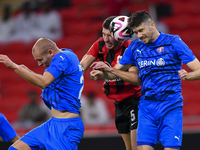 David Garcia (C) of Al Rayyan SC battles for the ball with Petrus Amersfoort (R) of Al Shahania SC during the Ooredoo Qatar Stars League 24/...