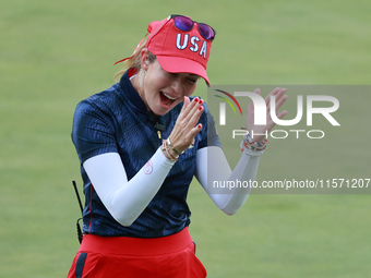 GAINESVILLE, VIRGINIA - SEPTEMBER 13: Vice Captain Paula Creamer of of Team USA celebrates after Nelly Korda’s putt on the 14th green during...