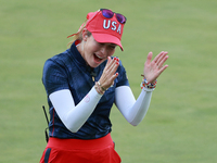 GAINESVILLE, VIRGINIA - SEPTEMBER 13: Vice Captain Paula Creamer of of Team USA celebrates after Nelly Korda’s putt on the 14th green during...