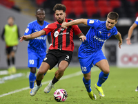 Hazem Ahmed Shehata (L) of Al Rayyan SC battles for the ball with Francesco Antonucci (R) of Al Shahania SC during the Ooredoo Qatar Stars L...