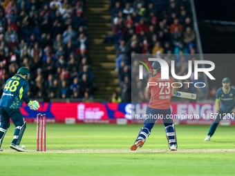 Liam Livingstone of England is bowled by Matthew Short of Australia for 87, leaving 1 run required to tie the series during the Second Vital...