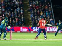 Liam Livingstone of England is bowled by Matthew Short of Australia for 87, leaving 1 run required to tie the series during the Second Vital...