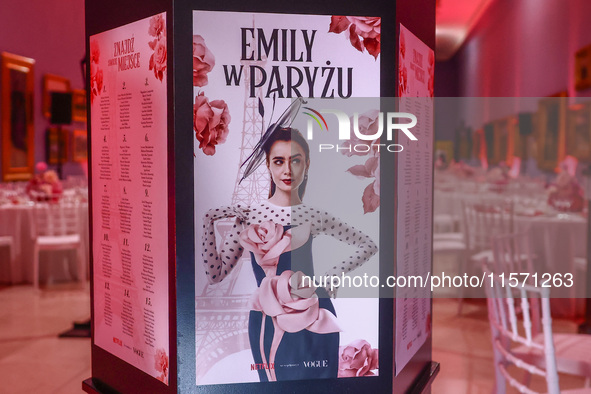 A poster with actress Lily Collins as Emily Cooper is seen during the premiere of the season fourth part two of 'Emily in Paris' Netflix ser...