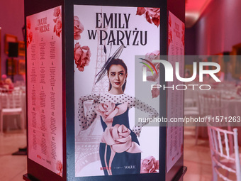 A poster with actress Lily Collins as Emily Cooper is seen during the premiere of the season fourth part two of 'Emily in Paris' Netflix ser...