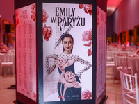 A poster with actress Lily Collins as Emily Cooper is seen during the premiere of the season fourth part two of 'Emily in Paris' Netflix ser...