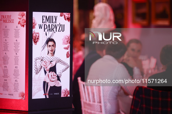 A poster with actress Lily Collins as Emily Cooper is seen during the premiere of the season fourth part two of 'Emily in Paris' Netflix ser...