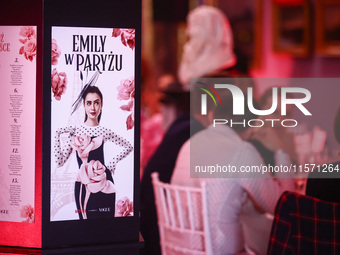 A poster with actress Lily Collins as Emily Cooper is seen during the premiere of the season fourth part two of 'Emily in Paris' Netflix ser...