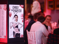 A poster with actress Lily Collins as Emily Cooper is seen during the premiere of the season fourth part two of 'Emily in Paris' Netflix ser...