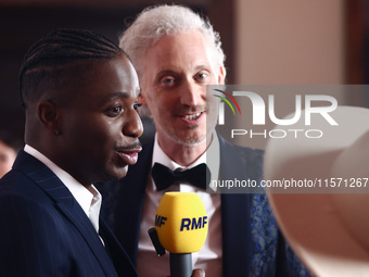 Actors Bruno Gouery and Samuel Arnold attend the premiere of the season fourth part two of 'Emily in Paris' Netflix series in Krakow, Poland...