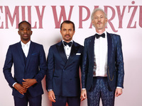 Actors Samuel Arnold, William Abadie and Bruno Gouery attend a photocall during the premiere of the season fourth part two of 'Emily in Pari...