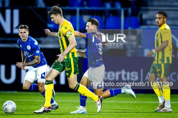 ADO Den Haag player Jari Vlak and FC Den Bosch player Torles Knoll during the match between Den Bosch and ADO at De Vliert for the Keuken Ka...