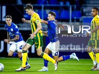 ADO Den Haag player Jari Vlak and FC Den Bosch player Torles Knoll during the match between Den Bosch and ADO at De Vliert for the Keuken Ka...