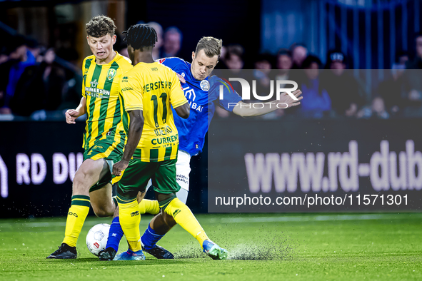 FC Den Bosch player Rik Mulders and ADO Den Haag player Joel Ideho during the match between Den Bosch and ADO at De Vliert for the Keuken Ka...