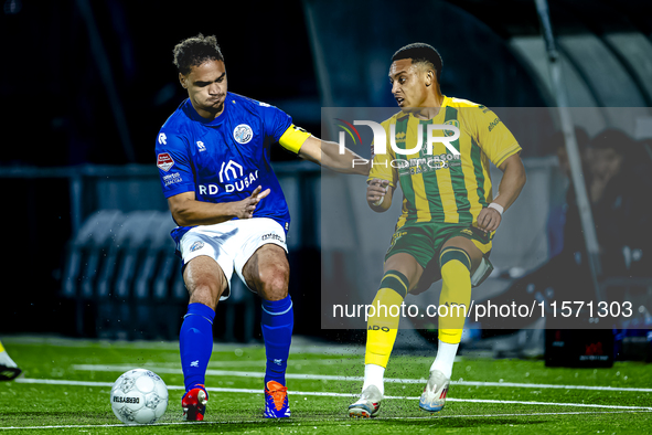 FC Den Bosch player Victor van den Bogaert and ADO Den Haag player Steven van der Sloot during the match between Den Bosch and ADO at De Vli...