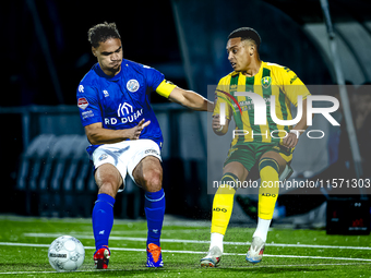 FC Den Bosch player Victor van den Bogaert and ADO Den Haag player Steven van der Sloot during the match between Den Bosch and ADO at De Vli...