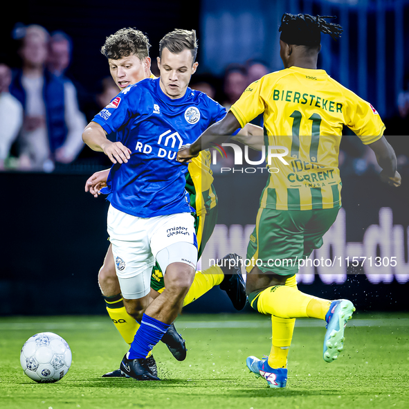 FC Den Bosch player Rik Mulders and ADO Den Haag player Joel Ideho during the match between Den Bosch and ADO at De Vliert for the Keuken Ka...