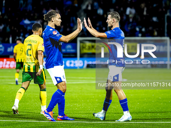 FC Den Bosch player Victor van den Bogaert and FC Den Bosch player Torles Knoll celebrate the goal during the match between Den Bosch and AD...