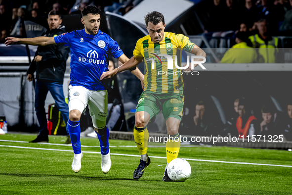 FC Den Bosch player Hicham Acheffay and ADO Den Haag player Daryl van Mieghem during the match between Den Bosch and ADO at De Vliert for th...