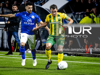 FC Den Bosch player Hicham Acheffay and ADO Den Haag player Daryl van Mieghem during the match between Den Bosch and ADO at De Vliert for th...