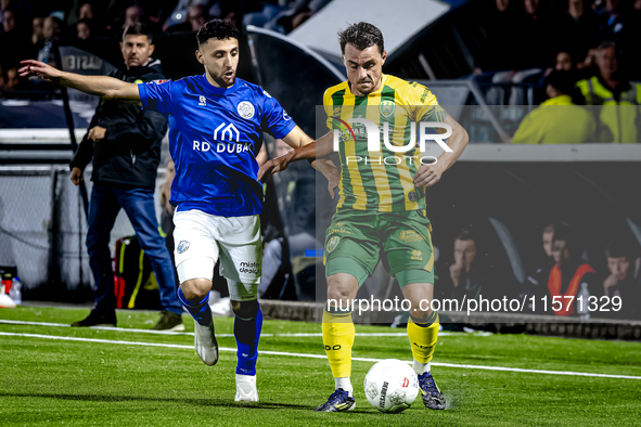 FC Den Bosch player Hicham Acheffay and ADO Den Haag player Daryl van Mieghem during the match between Den Bosch and ADO at De Vliert for th...