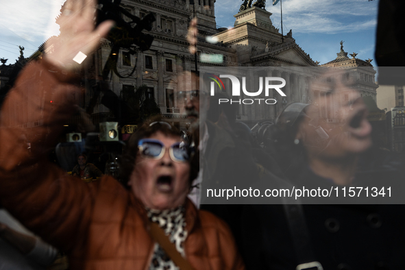 Retirees, social organizations, and unions mobilize in front of the National Congress of the Republic of Argentina in Buenos Aires, Argentin...