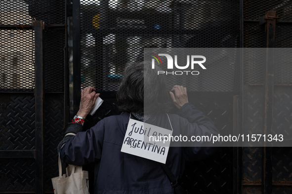 Retirees, social organizations, and unions mobilize in front of the National Congress of the Republic of Argentina in Buenos Aires, Argentin...