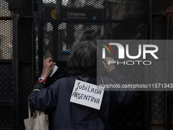 Retirees, social organizations, and unions mobilize in front of the National Congress of the Republic of Argentina in Buenos Aires, Argentin...