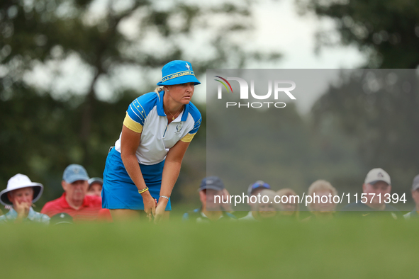 GAINESVILLE, VIRGINIA - SEPTEMBER 13: Anna Nordqvist of Team Europe lines up her putt on the third green during Fourball Matches on Day One...