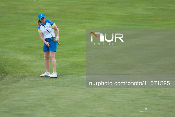 GAINESVILLE, VIRGINIA - SEPTEMBER 13: Leona Maguire of Team Europe follows her putt on the 14th green during Fourball Matches on Day One of...