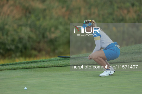 GAINESVILLE, VIRGINIA - SEPTEMBER 13: Emily Kristine Pedersen of Team Europe reacts to her putt on the 15th green during Fourball Matches on...