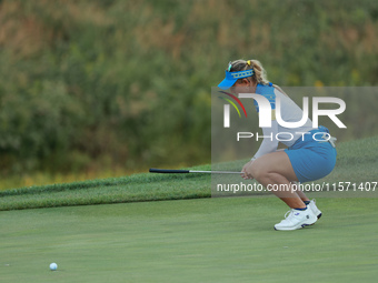 GAINESVILLE, VIRGINIA - SEPTEMBER 13: Emily Kristine Pedersen of Team Europe reacts to her putt on the 15th green during Fourball Matches on...