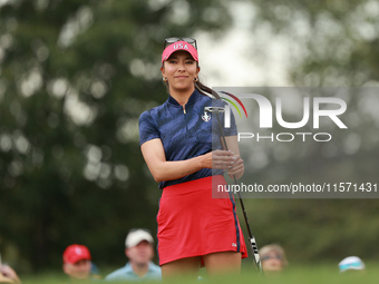 GAINESVILLE, VIRGINIA - SEPTEMBER 13: Alison Lee of the United States reacts to her putt on the third green during Fourball Matches on Day O...