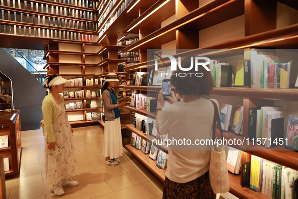 People visit TSUTAYA BOOKS in Xi'an, China, on September 13, 2024. On September 9, Xi'an TSUTAYA BOOKS issues a notice of closure and will c...