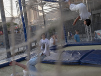 Iranian teenagers play at Adrenaline Park in Tehran, Iran, on September 13, 2024. Amir Badri, an Iranian stuntman and award winner of the Sc...