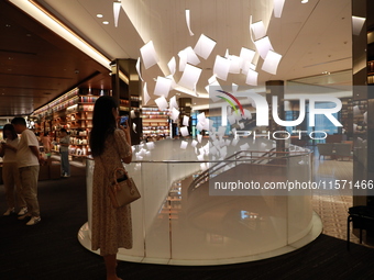 People visit TSUTAYA BOOKS in Xi'an, China, on September 13, 2024. On September 9, Xi'an TSUTAYA BOOKS issues a notice of closure and will c...