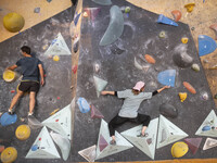 Two young Iranian rock climbers climb a wall at Adrenaline Park in Tehran, Iran, on September 13, 2024. Amir Badri, an Iranian stuntman and...