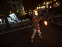 A young Iranian woman performs with fire at Adrenaline Park in Tehran, Iran, on September 13, 2024. Adrenaline Park is founded by Amir Badri...