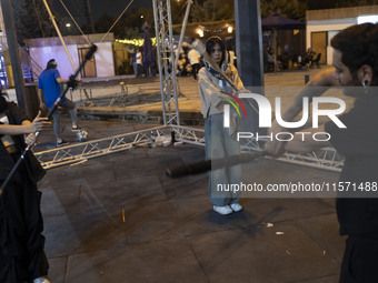 Iranian youths perform at Adrenaline Park in Tehran, Iran, on September 13, 2024. Amir Badri, an Iranian stuntman and award winner of the Sc...