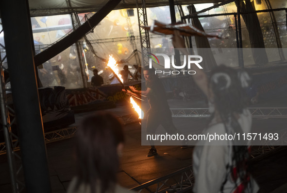 A young Iranian man performs with fire at Adrenaline Park in Tehran, Iran, on September 13, 2024. Adrenaline Park is founded by Amir Badri,...