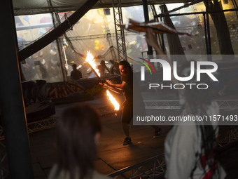 A young Iranian man performs with fire at Adrenaline Park in Tehran, Iran, on September 13, 2024. Adrenaline Park is founded by Amir Badri,...