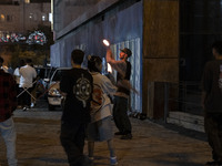 A young Iranian man performs with fire at Adrenaline Park in Tehran, Iran, on September 13, 2024. Adrenaline Park is founded by Amir Badri,...